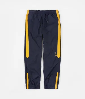 Nike SB Shield Swoosh Track Pants - Obsidian / Dark Sulfur / Dark Sulfur